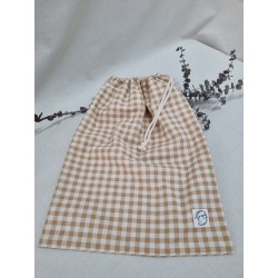 Bolsa de muda cuadro beige
