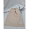 Bolsa de muda cuadro beige